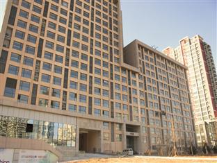 צ'ינגדאו Sweetome Vacation Rentals Pollex Plaza מראה חיצוני תמונה